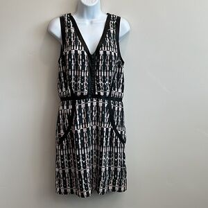 Dress. Cocktail length. Faux Leather edge. Size M